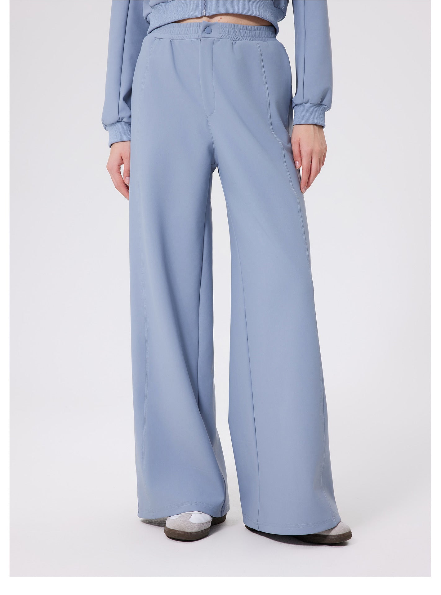 Light blue high-waist loose fitness warm pants with button detail from Zara