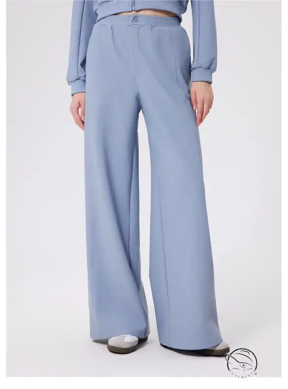 Light blue loose fitness warm pants with high waist and button detail from Zara