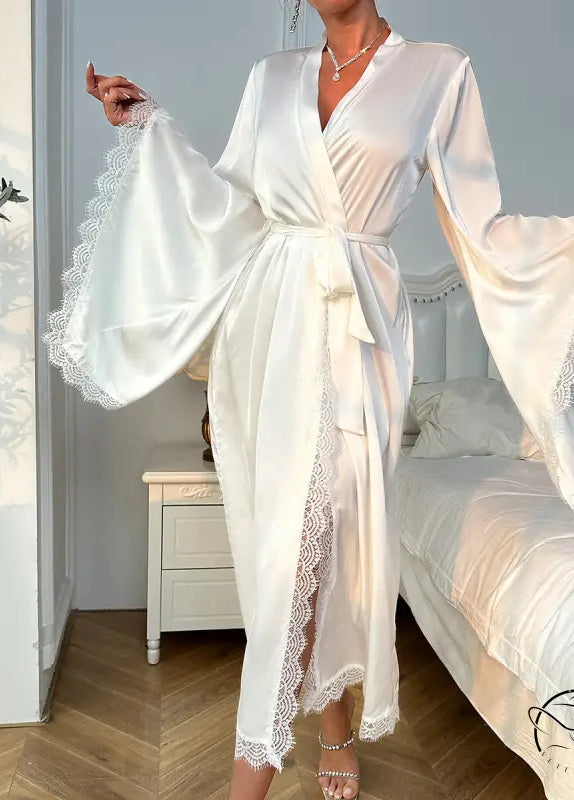 White satin long sleeve nightgown with lace trim and side slit