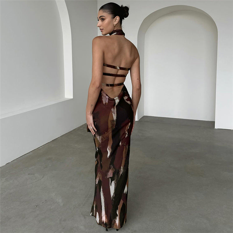 Backless brown and white patterned maxi dress with strappy details, ideal for evening events