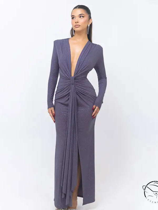 Beautiful slit slim fitting dress with long sleeves, deep V-neck, and draped gray fabric