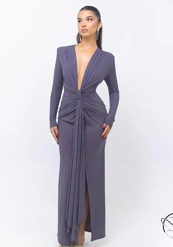 Beautiful slit slim fitting dress with long sleeves, deep V-neck, and draped gray fabric