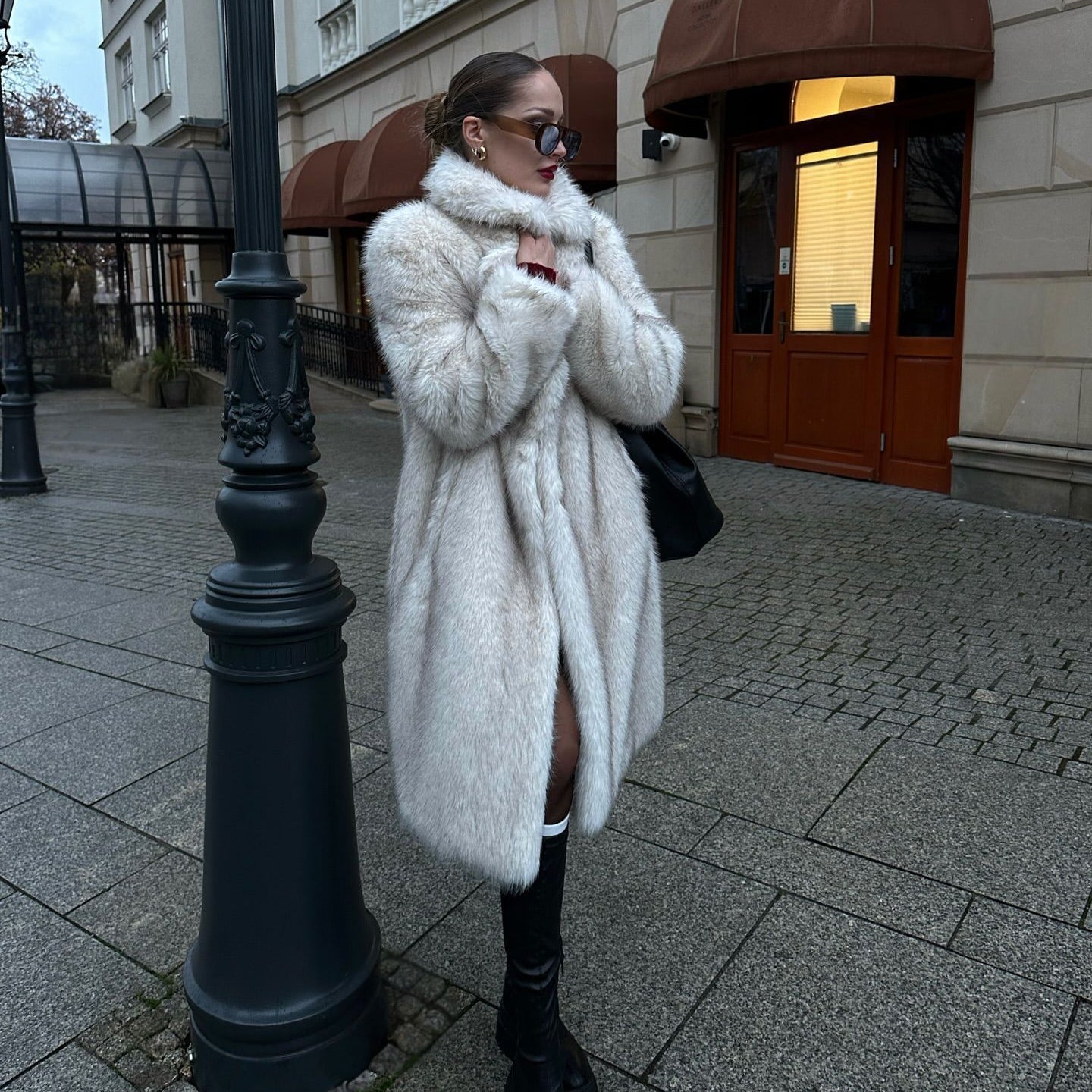 Warm Winter Faux Fur Coat in Langry Fashion with White Fur and Black Trim