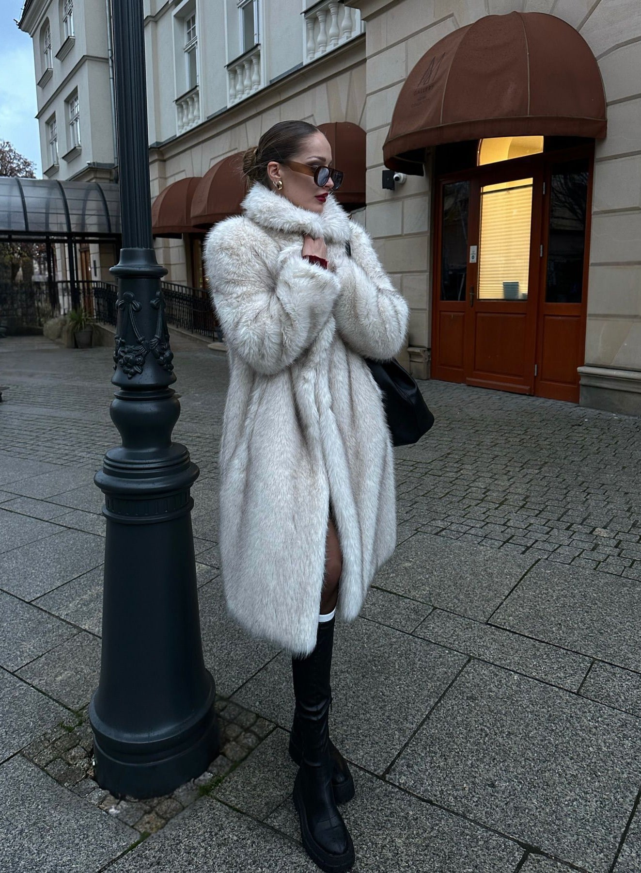 Warm Winter Faux Fur Coat in Langry Fashion with White Fur and Black Trim