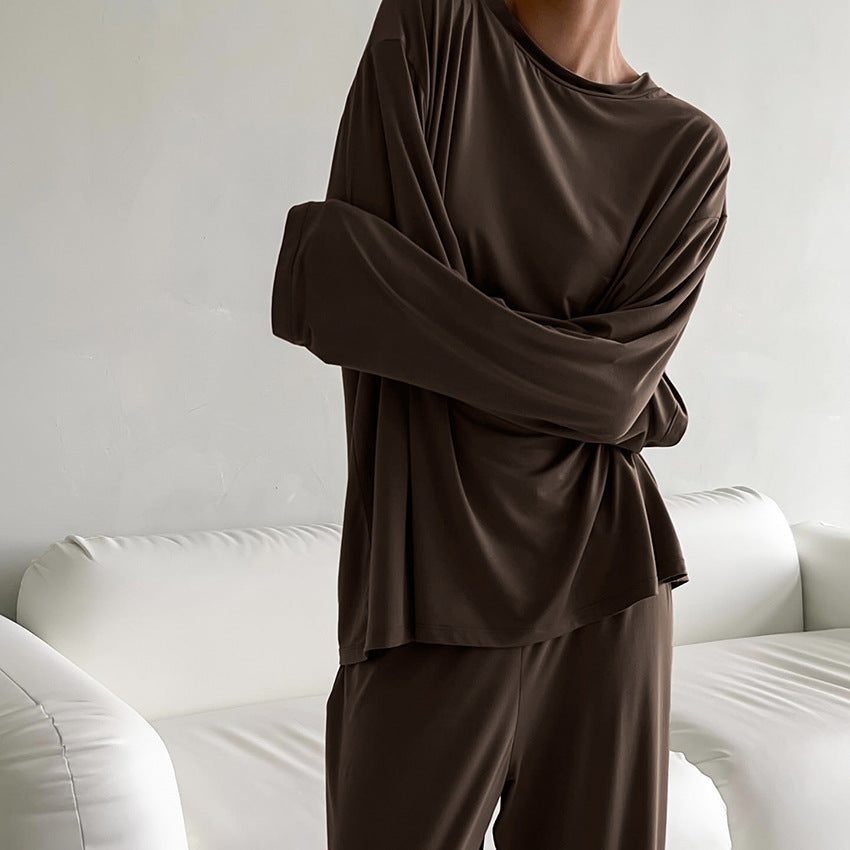 Woman wearing dark brown long-sleeved round neck langry casual pajamas for homewear