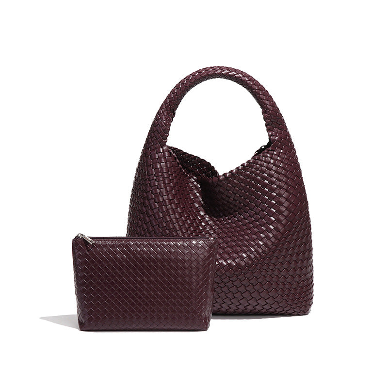 Woven burgundy leather hobo bag and matching pouch, a stylish addition to any fashion ensemble