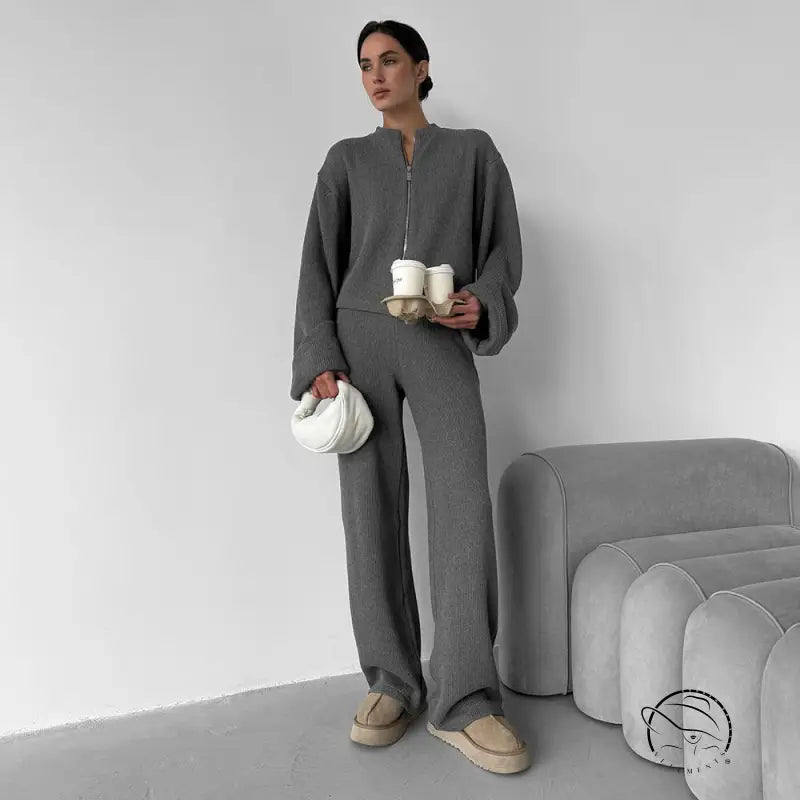 Charcoal gray oversized langry sweater with wide sleeves and zipper detail