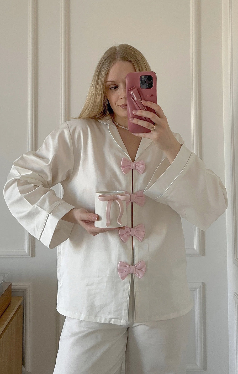 White satin langry pajama set with pink bow accents