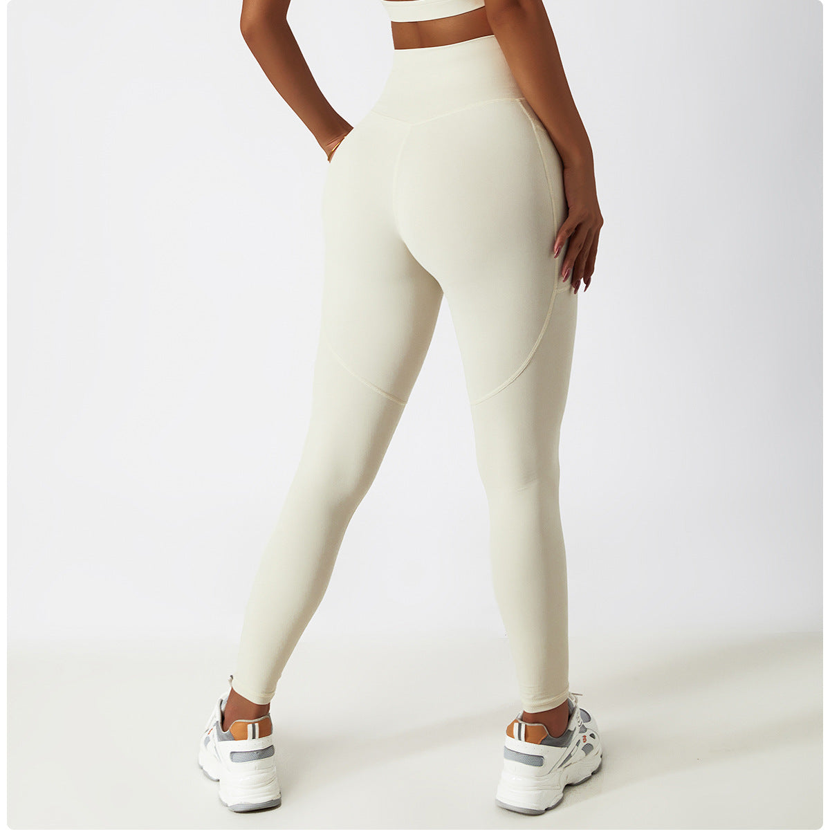 Cream-colored high-waisted leggings for women, seamless design in fashionable langry ملابس