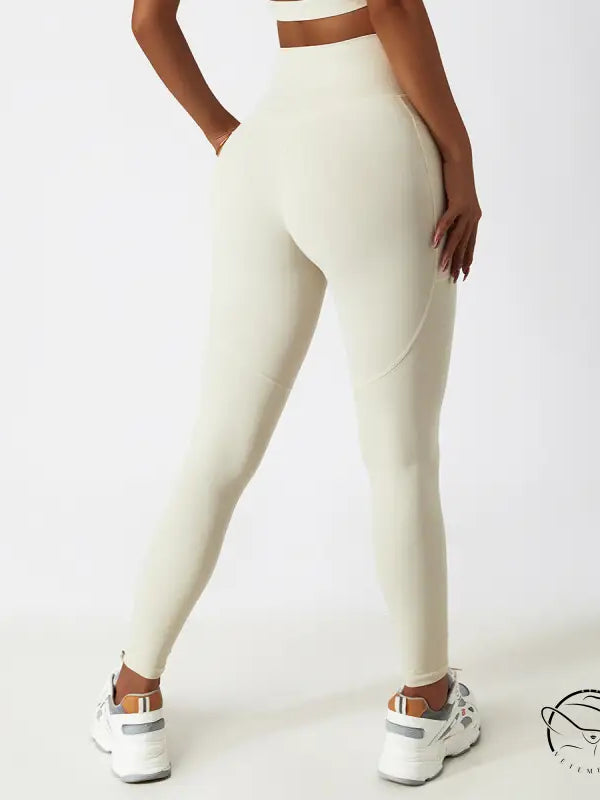 Cream-colored high-waisted seamless yoga pants for breathable fashion
