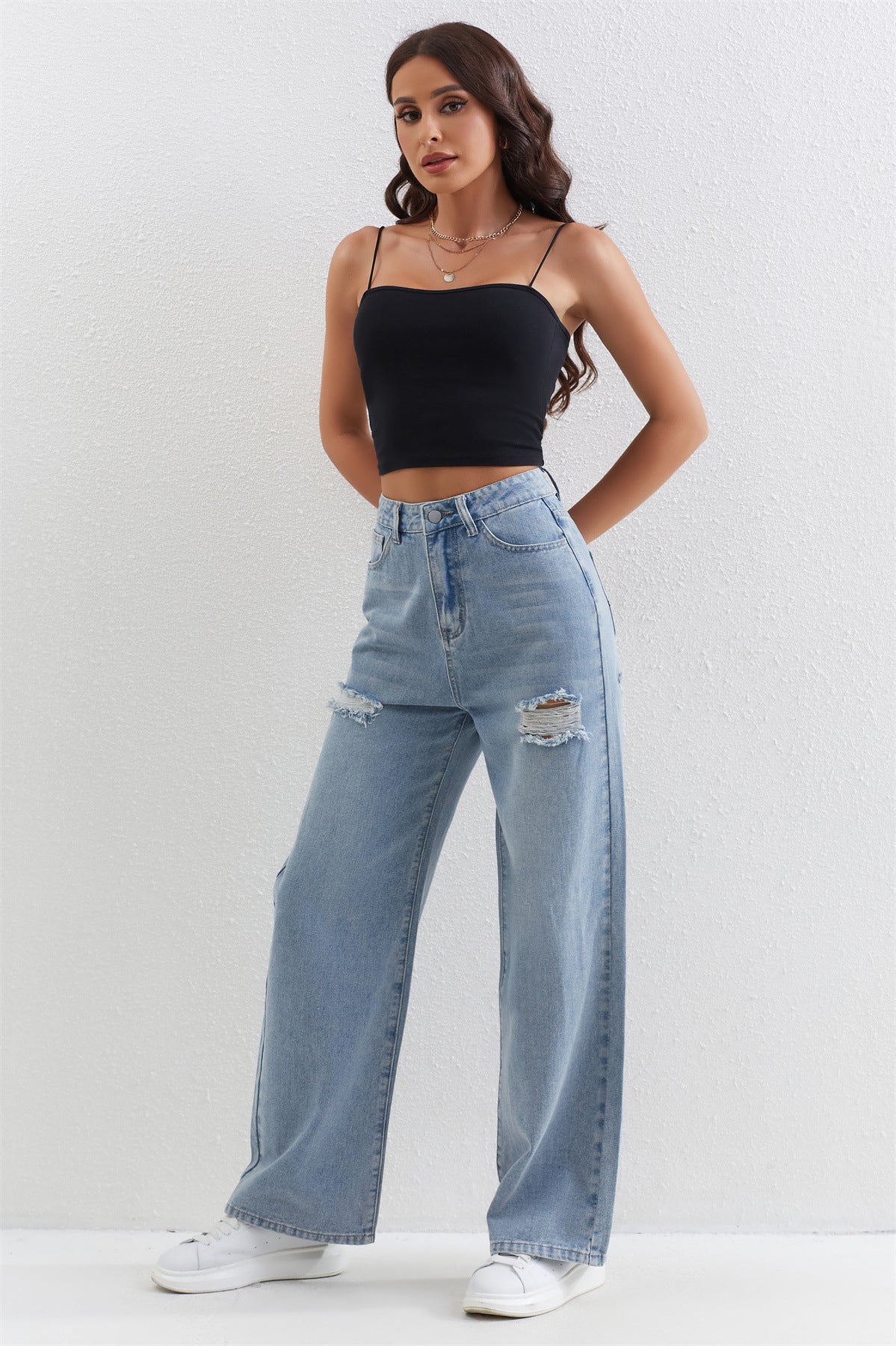 Light blue distressed wide-leg jeans with thigh rips, trendy fashion ملابس for casual wear