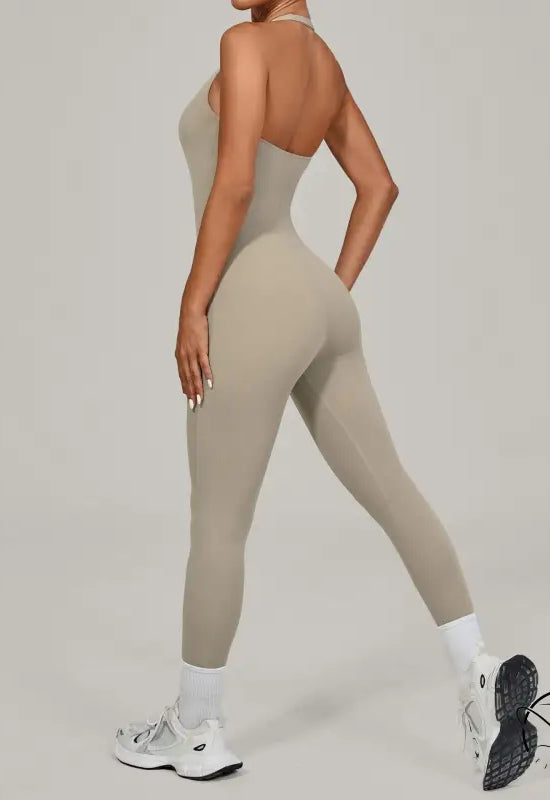 Sleek beige langry fashion halter yoga jumpsuit for outdoor wear