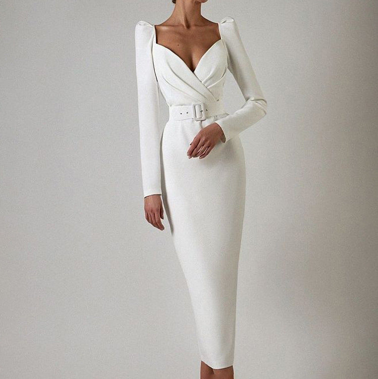 Elegant white long-sleeved wrap dress with belt for graceful fashion statements