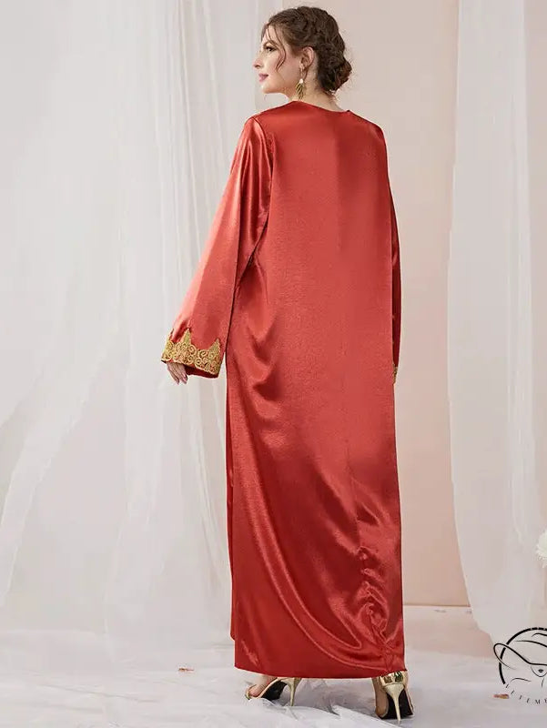 Elegant red satin abaya with gold embroidered cuffs in langry fashion