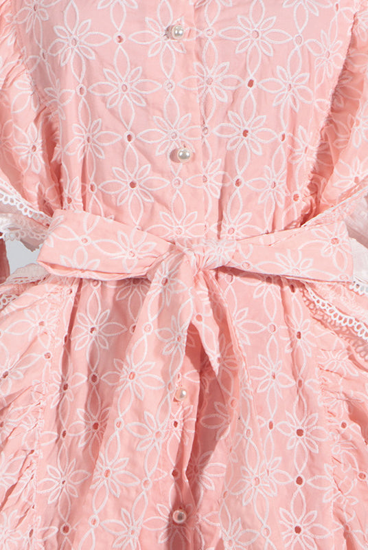 Pink eyelet dress with stand collar, white lace, and tie waist for elegant fashion