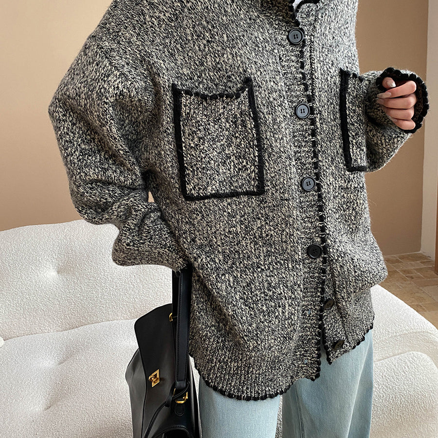Fashionable double pocket loose knitted sweater coat with tweed jacket, jeans, cushion, handbag