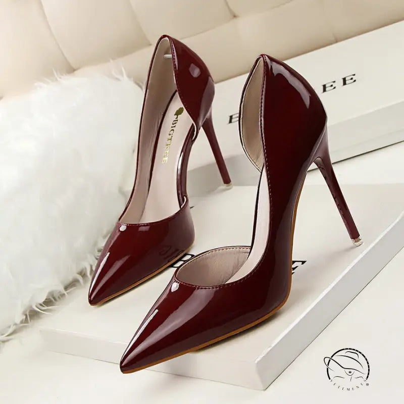 Glossy burgundy patent leather low cut high heels with pointed toes