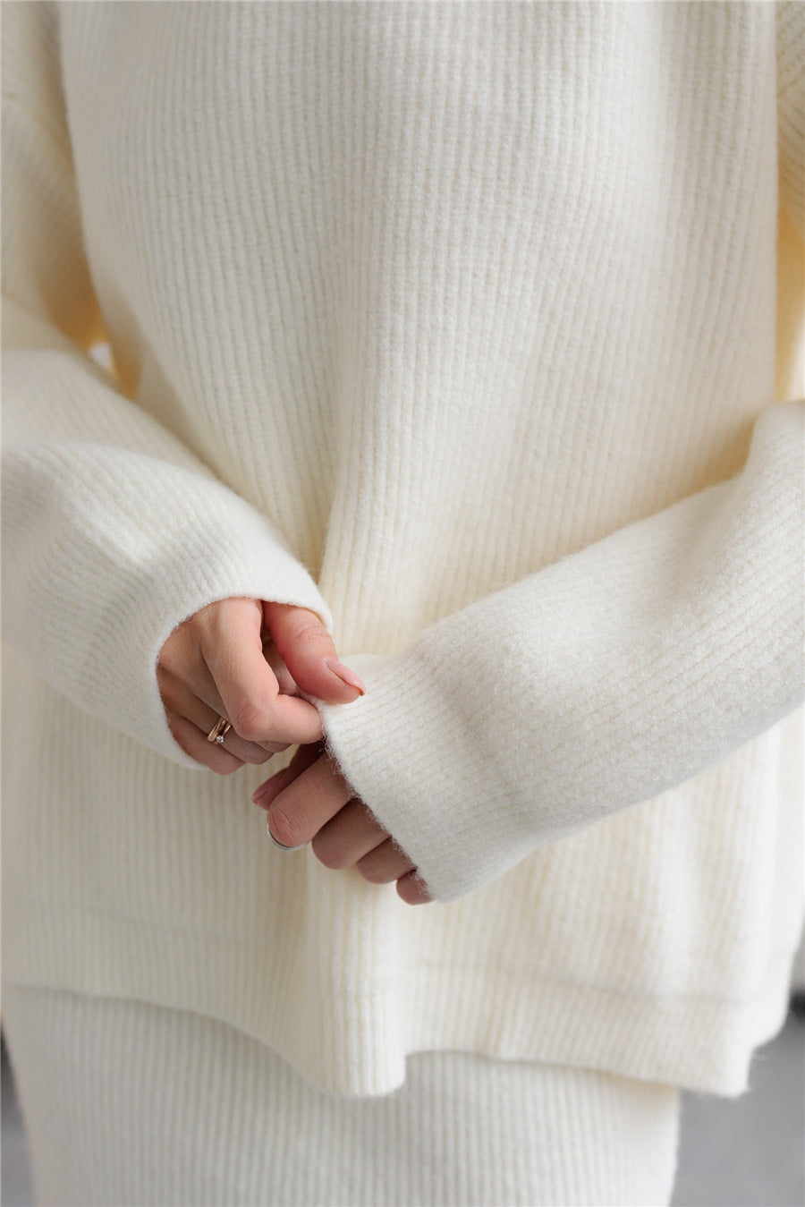 Cream-colored ribbed knit sweater from Elegant Design Cardigan Knitted Skirt Sets for fashion