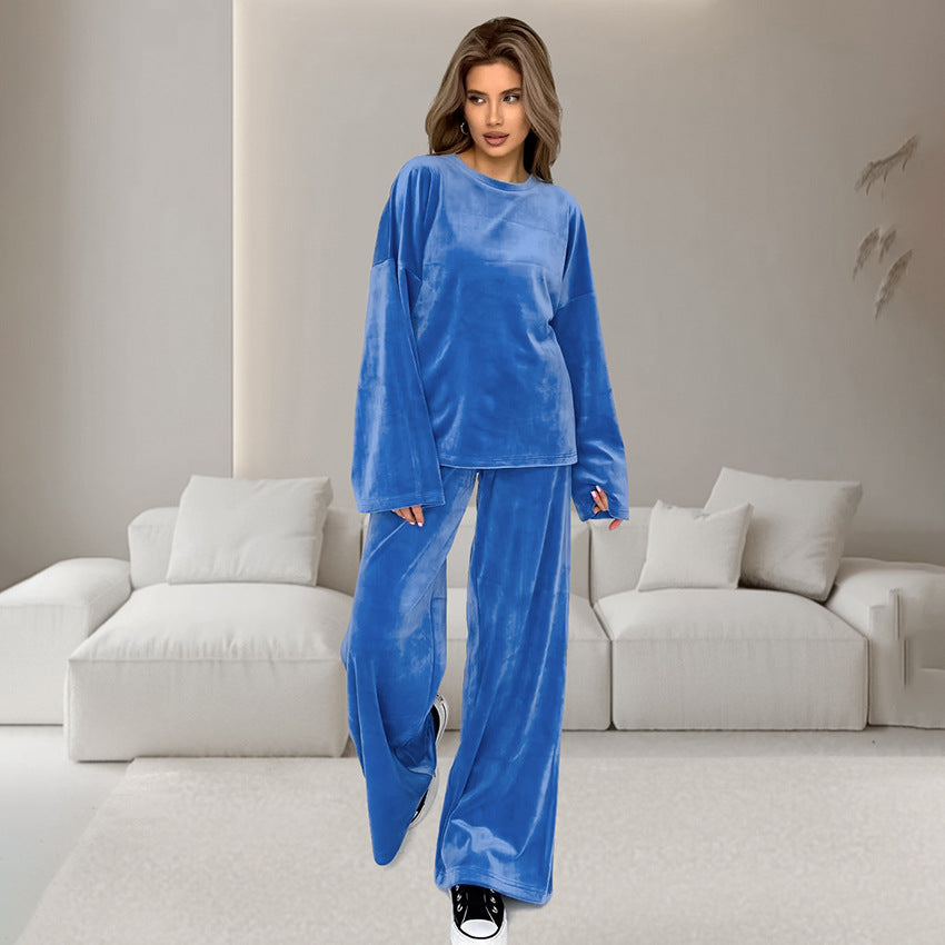 Woman wearing relaxed-fit blue velvet pajamas sets from Warm Comfortable Velvet Pajamas Sets