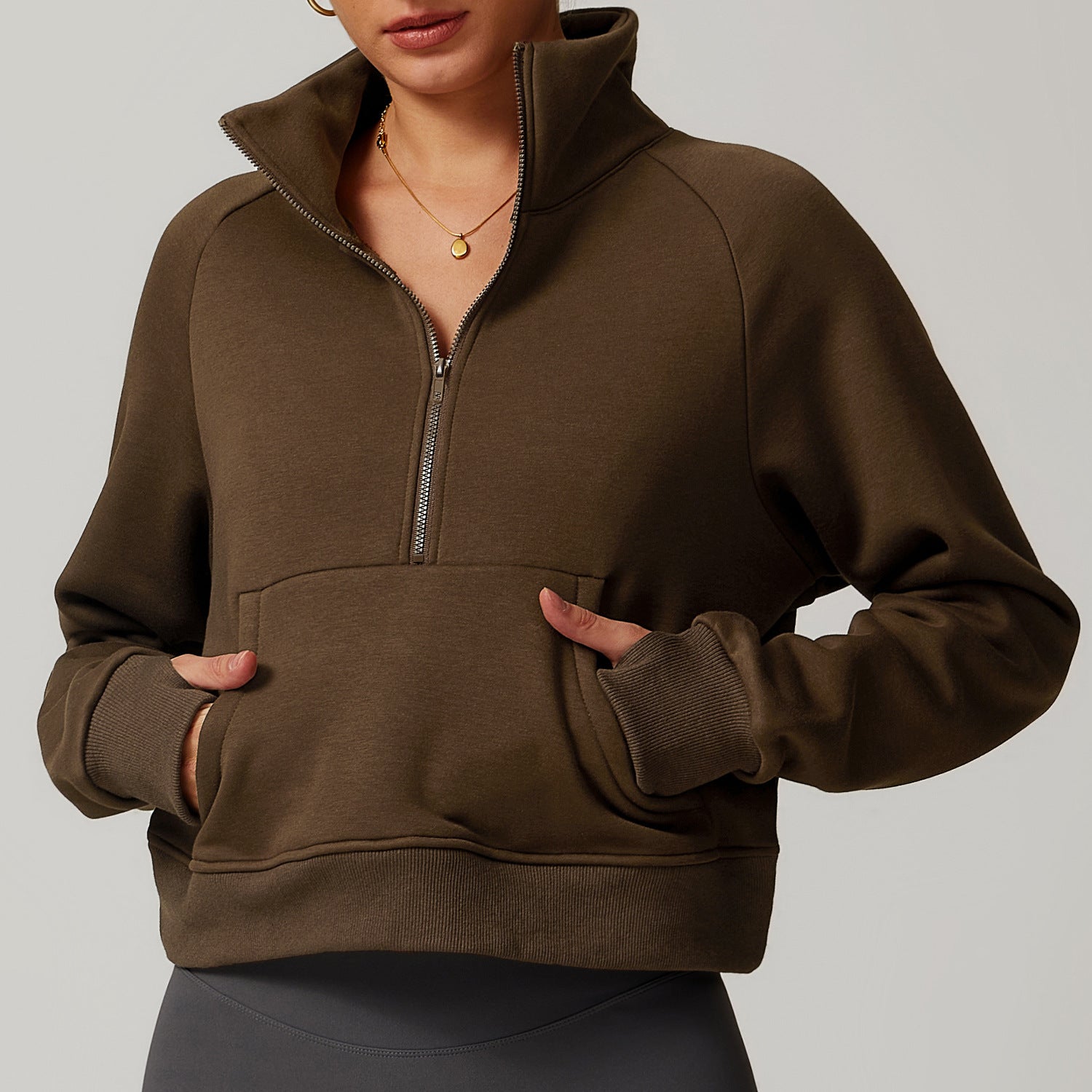 Brown half-zip pullover sweatshirt with pocket, ideal for winter fashion by Langry