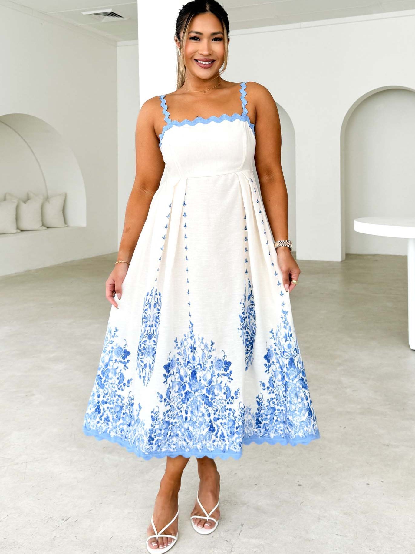 Attractive Backless Dress featuring a white floral sundress design for stylish fashion ملابس