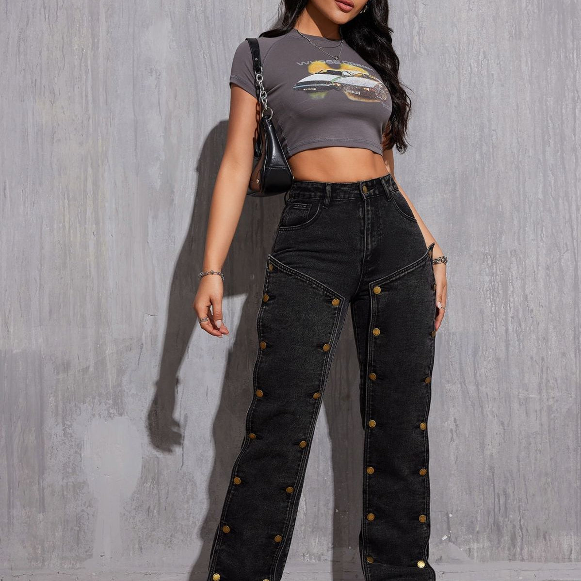 Women’s black high-waisted wide-leg cargo pants with button details for hip hop style