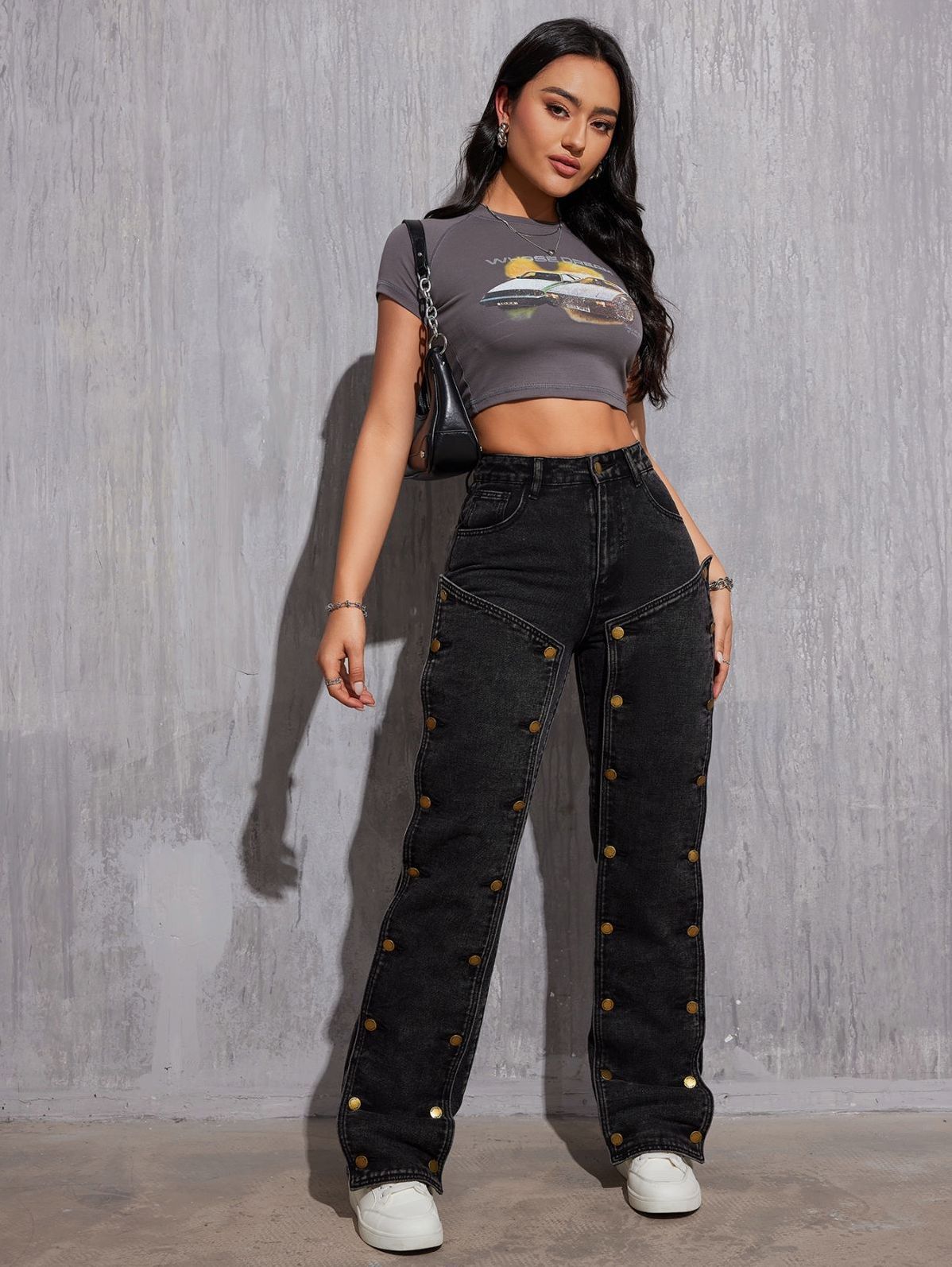 Women’s black high-waisted wide-leg cargo pants with button details for hip hop style