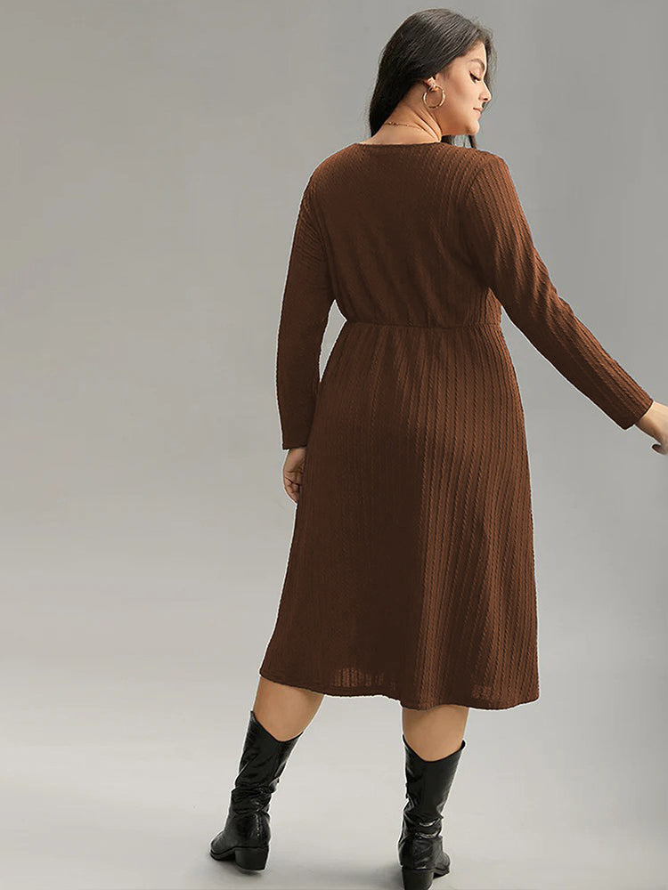 Plus-size brown long-sleeve midi match office dress with ribbed texture and black knee-high boots