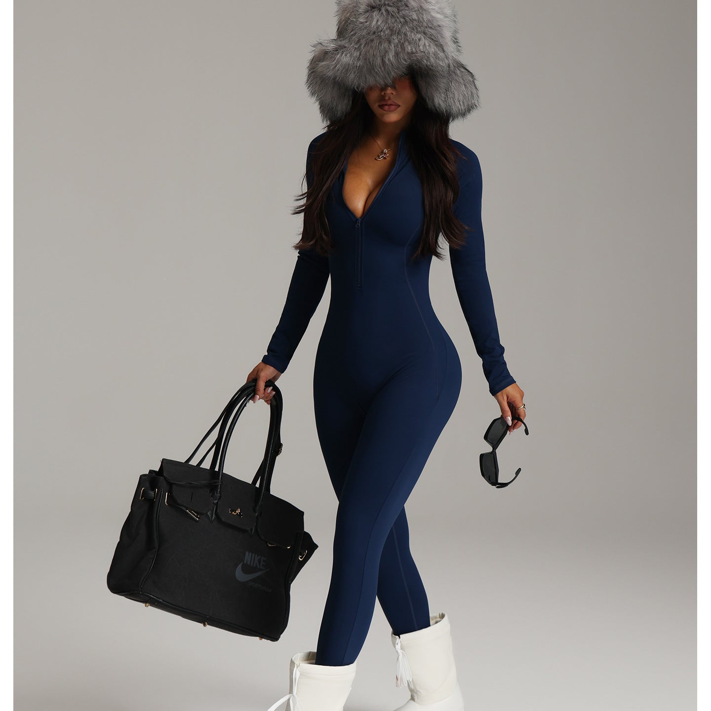 Navy blue langry fashion one-piece yoga bodysuit with fur hood and white platform boots
