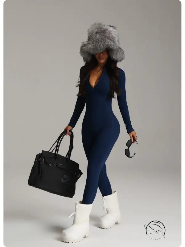 Navy blue langry fashion bodysuit with fur hood and white platform boots