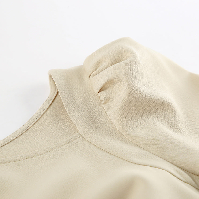 Beige puff sleeve blouse with elegant puff sleeve and sleeve tight split design