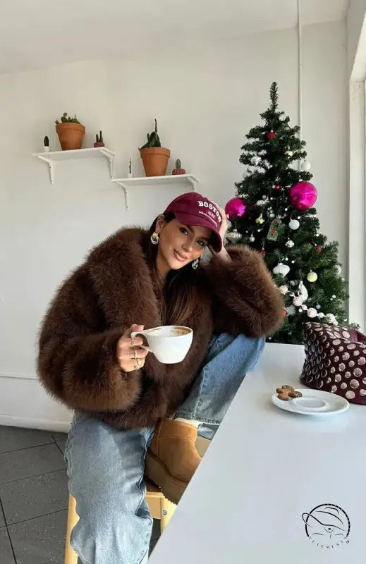 Gorgeous faux fur fox jacket in brown with red cap and jeans
