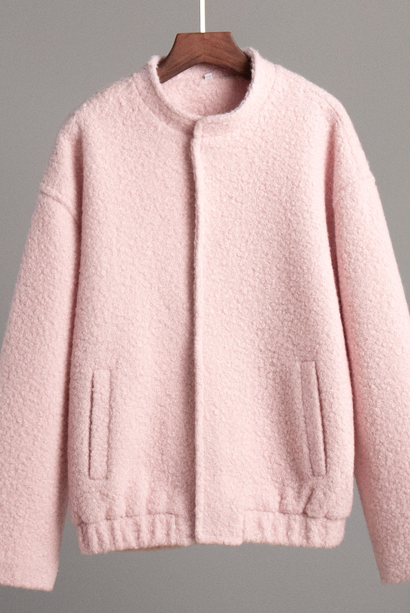 Pink textured bomber jacket featured in Pink Short Furry Coat showcasing stylish short furry design