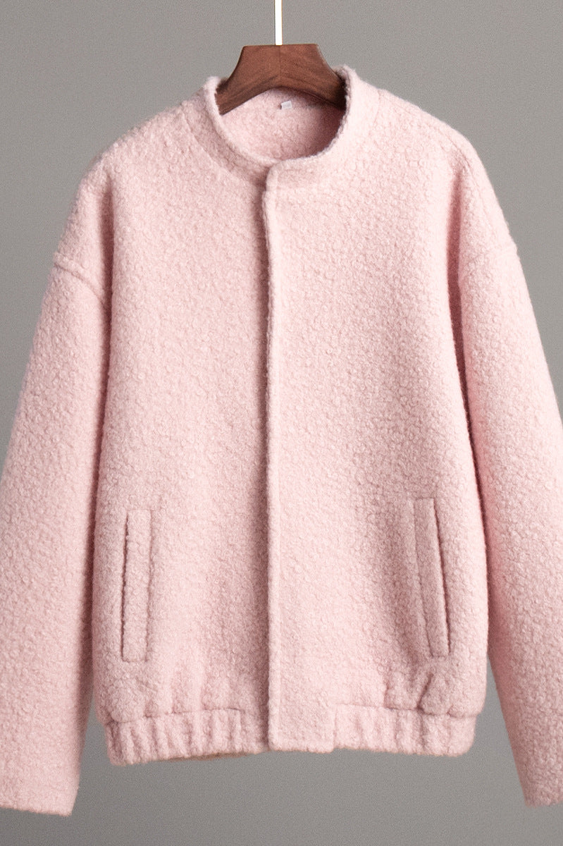 Pink textured bomber jacket featured in Pink Short Furry Coat showcasing stylish short furry design