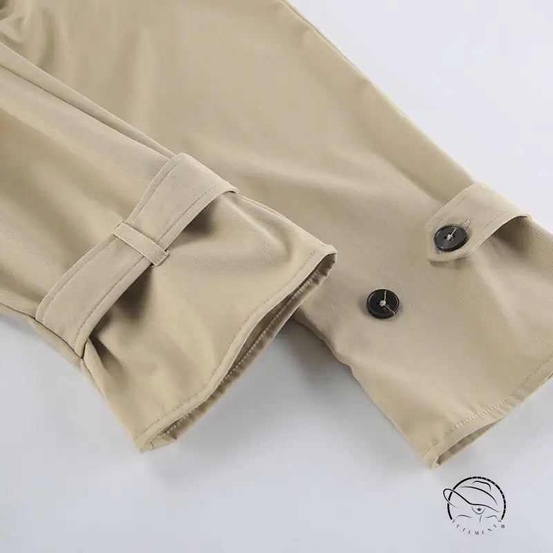 British long sleeve high sense mid length trench coat in khaki with buttoned cuffs and belt loops