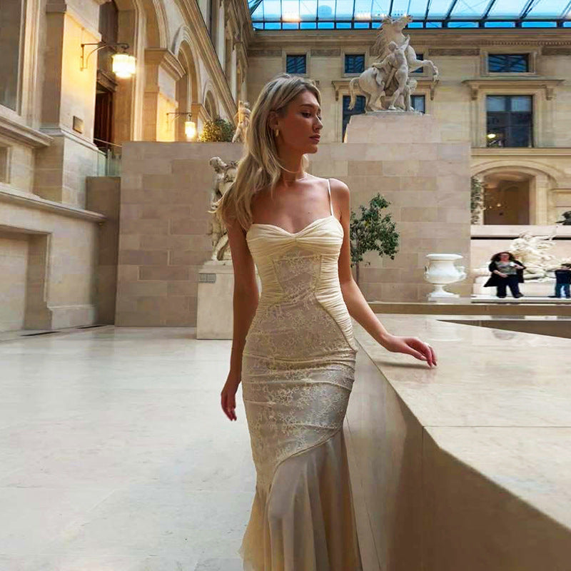 Elegant lace gown showcasing a stylish cami dress in contemporary fashion