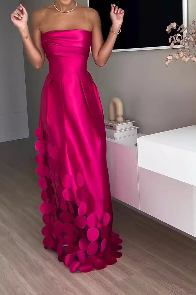 Elegant strapless fuchsia gown with circular embellishments showcasing Langry fashion style