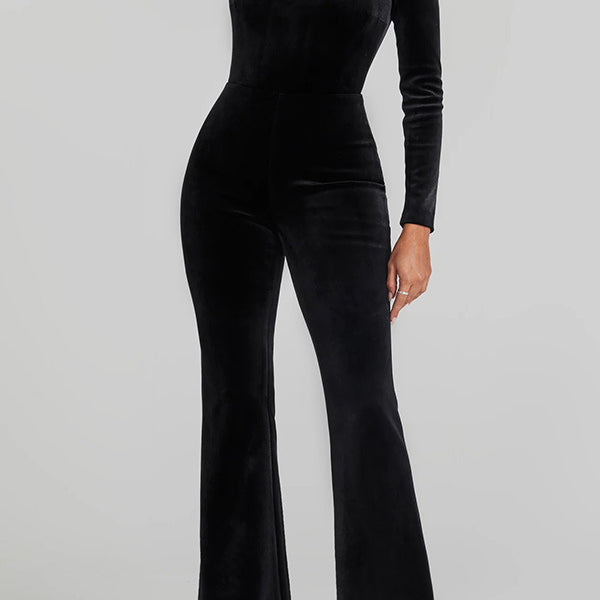 Black velvet jumpsuit with flared legs and crystal neckline, perfect for langry fashion