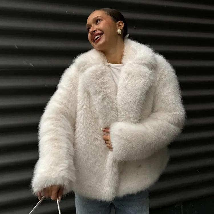 White fluffy faux fur coat with high collar and long sleeves for winter fashion