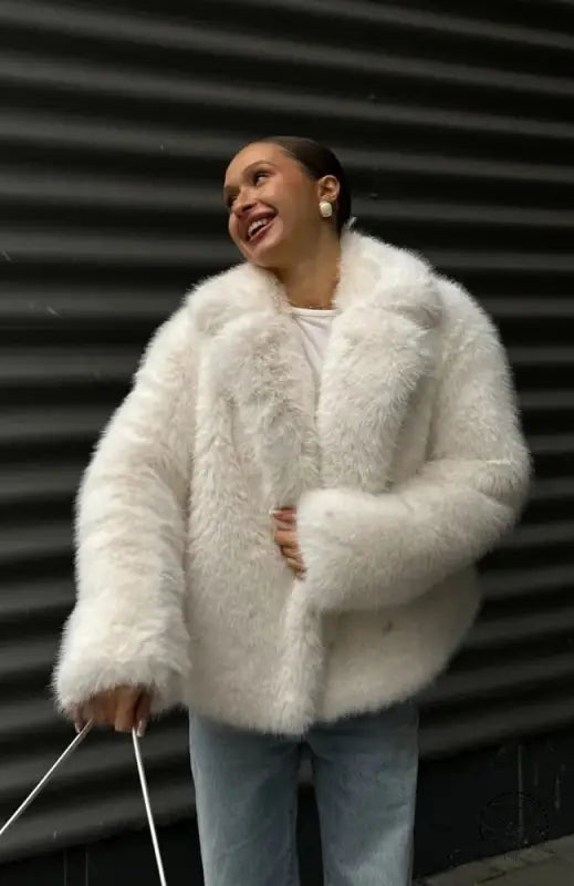 Winter warm faux fur coat with white fluffy high collar and long sleeves