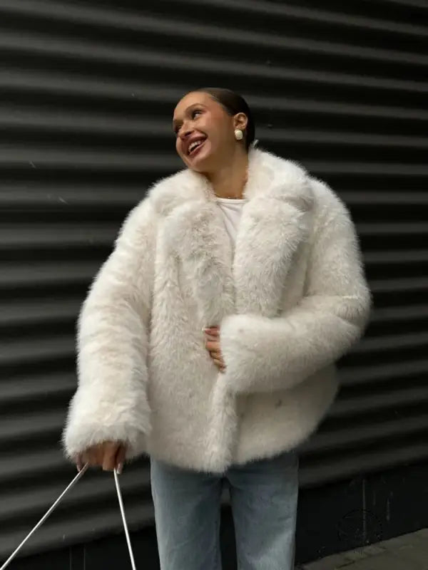 Winter warm faux fur coat with white fluffy high collar and long sleeves