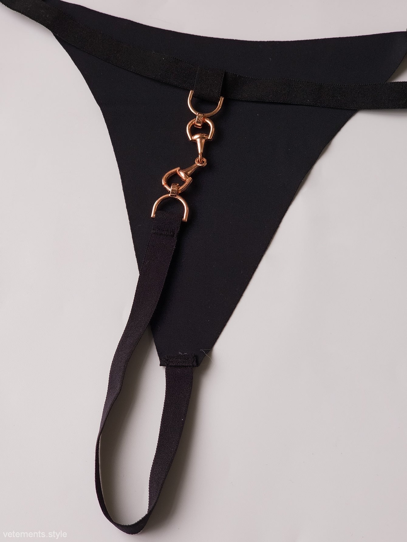 Sexy pure lady T shaped panties featuring black thong with gold hardware