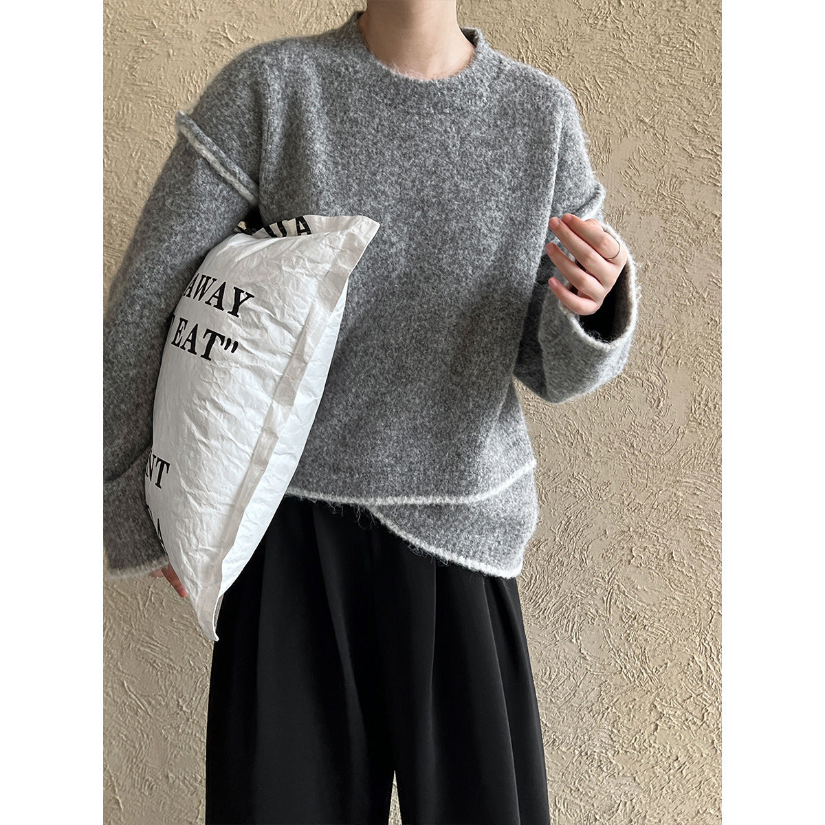 Grey knit Loose Casual Cozy Sweater styled with black pants, perfect for trendy ملابس