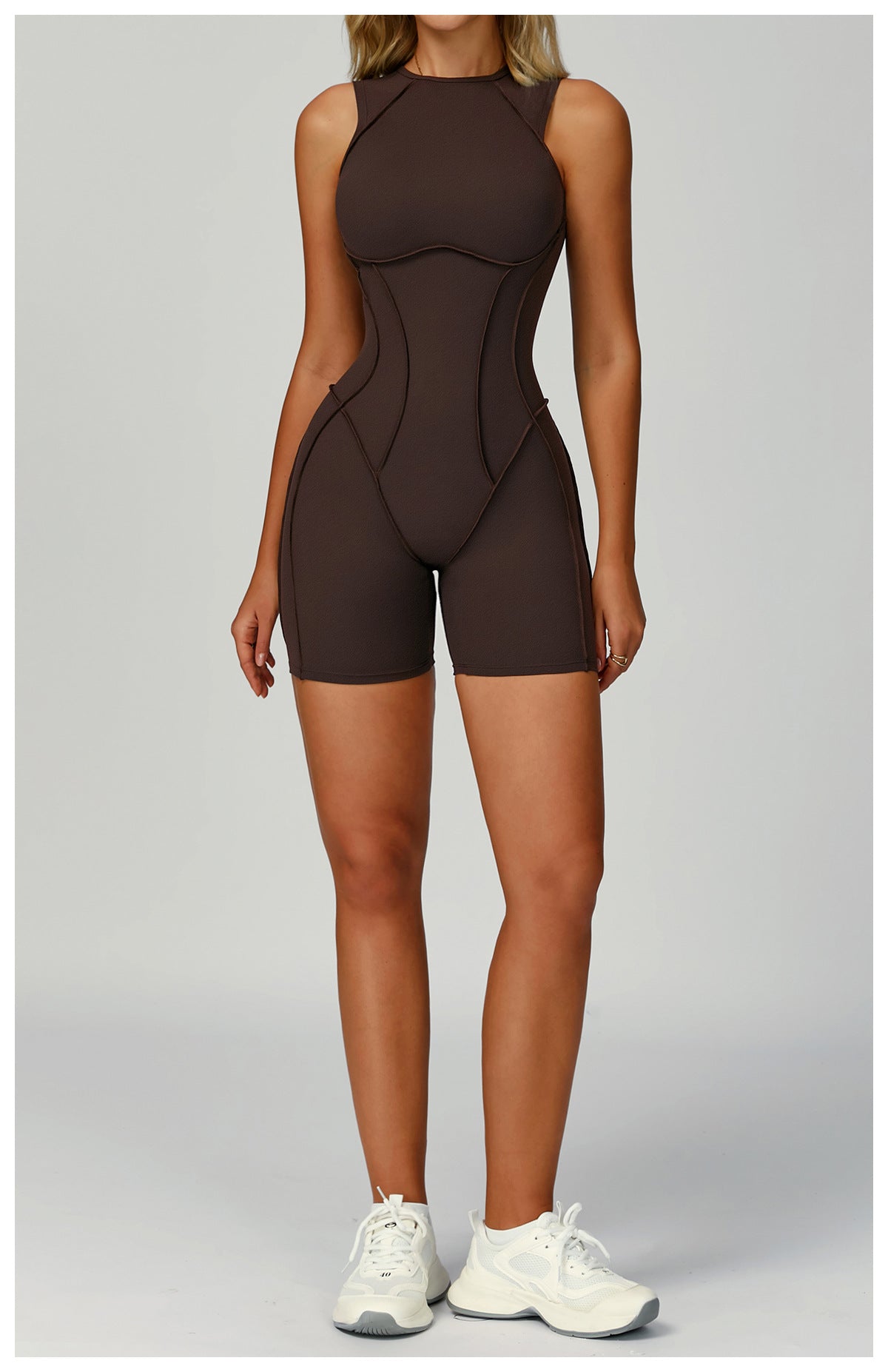 Langry brown seamless yoga jumpsuit with white sneakers and black laces