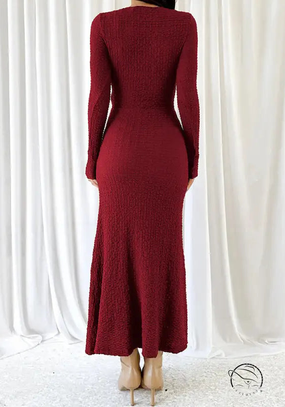 Beautiful knitted burgundy textured long-sleeved dress