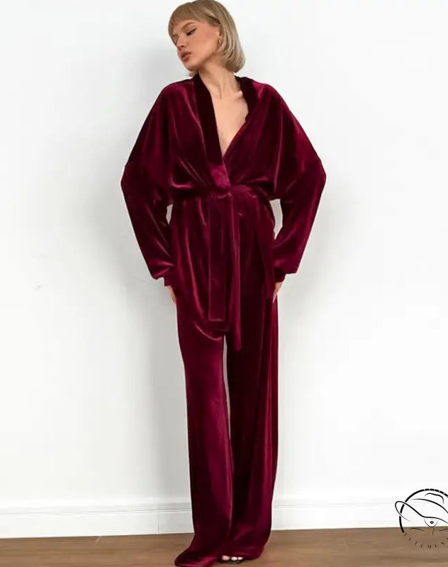 Woman in comfortable cardigan thermal red velvet jumpsuit