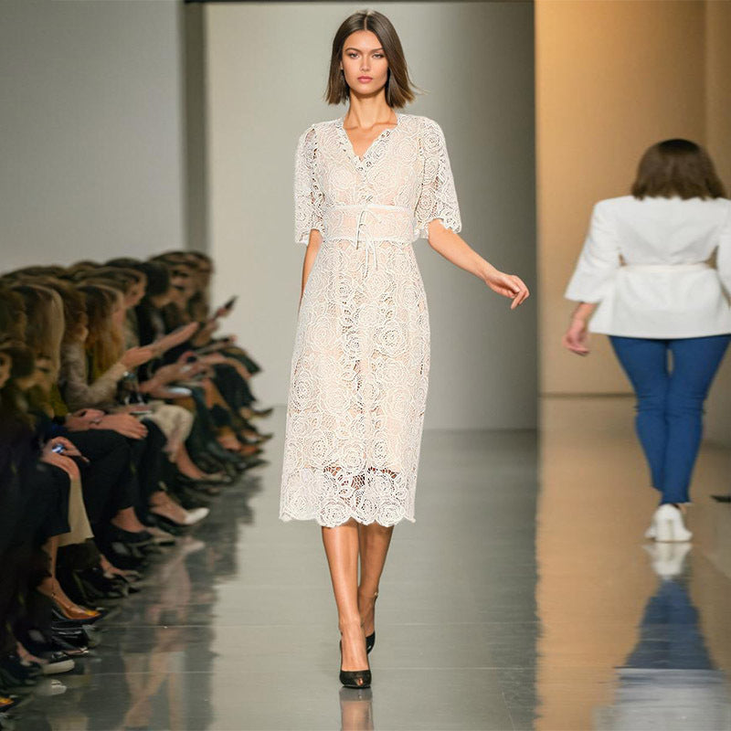 White lace midi dress with elbow-length sleeves, perfect for fashion-forward summer events