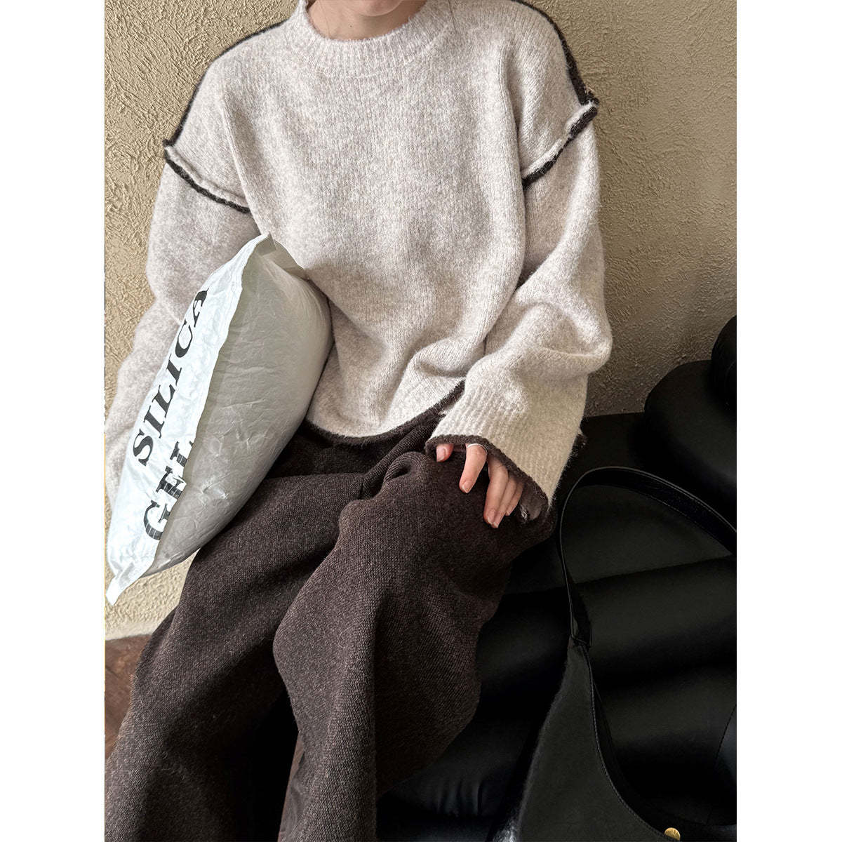 Cream-colored knit sweater with dark brown pants for stylish casual fashion ملابس