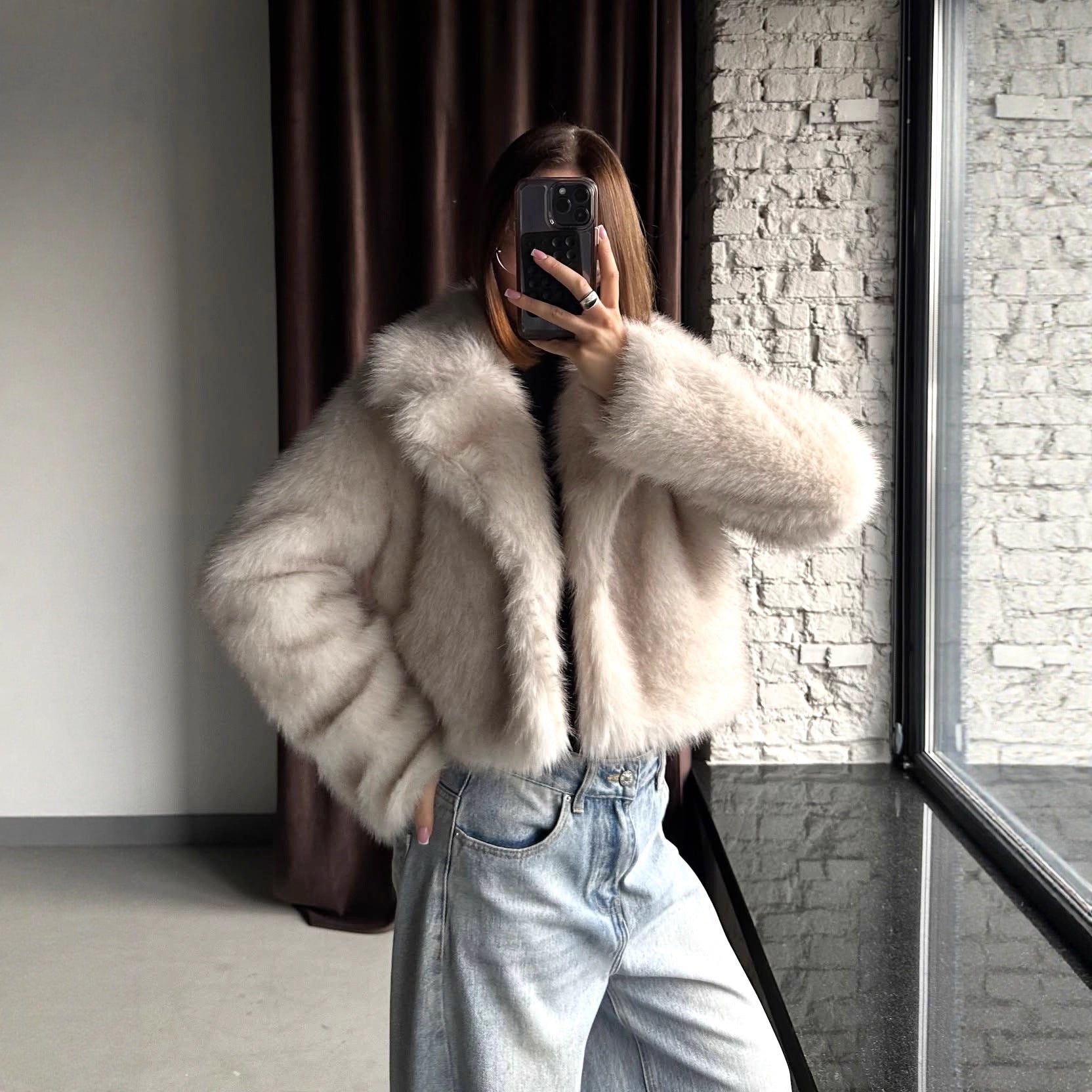 Warm faux fur baggy coat in light beige plush texture with cozy sleeves