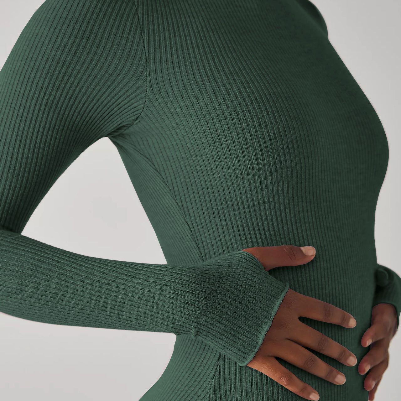 Green ribbed long sleeve bodysuit with high collar long design for women